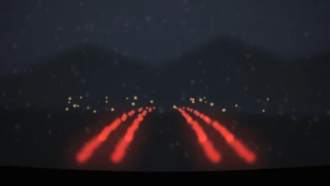 Gotthard Stau: Kolonne mit Rücklichtern vor dem Gotthardtunnel in der Dämmerung